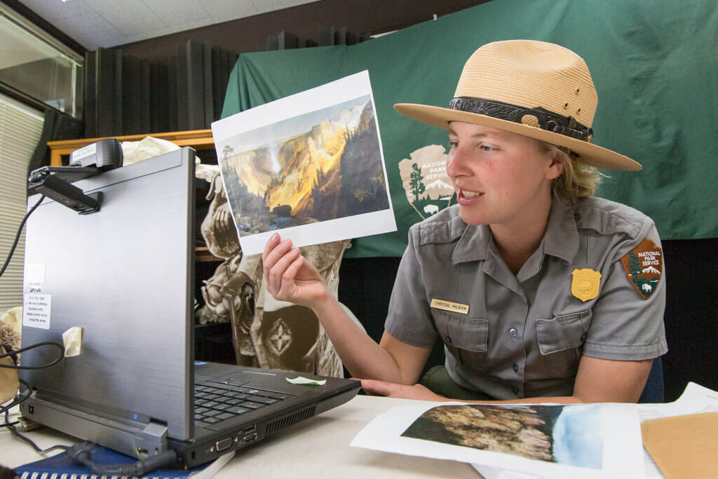 Yellowstone ranger giving a virtual program to a school group. Photo by YF / Matt Ludin