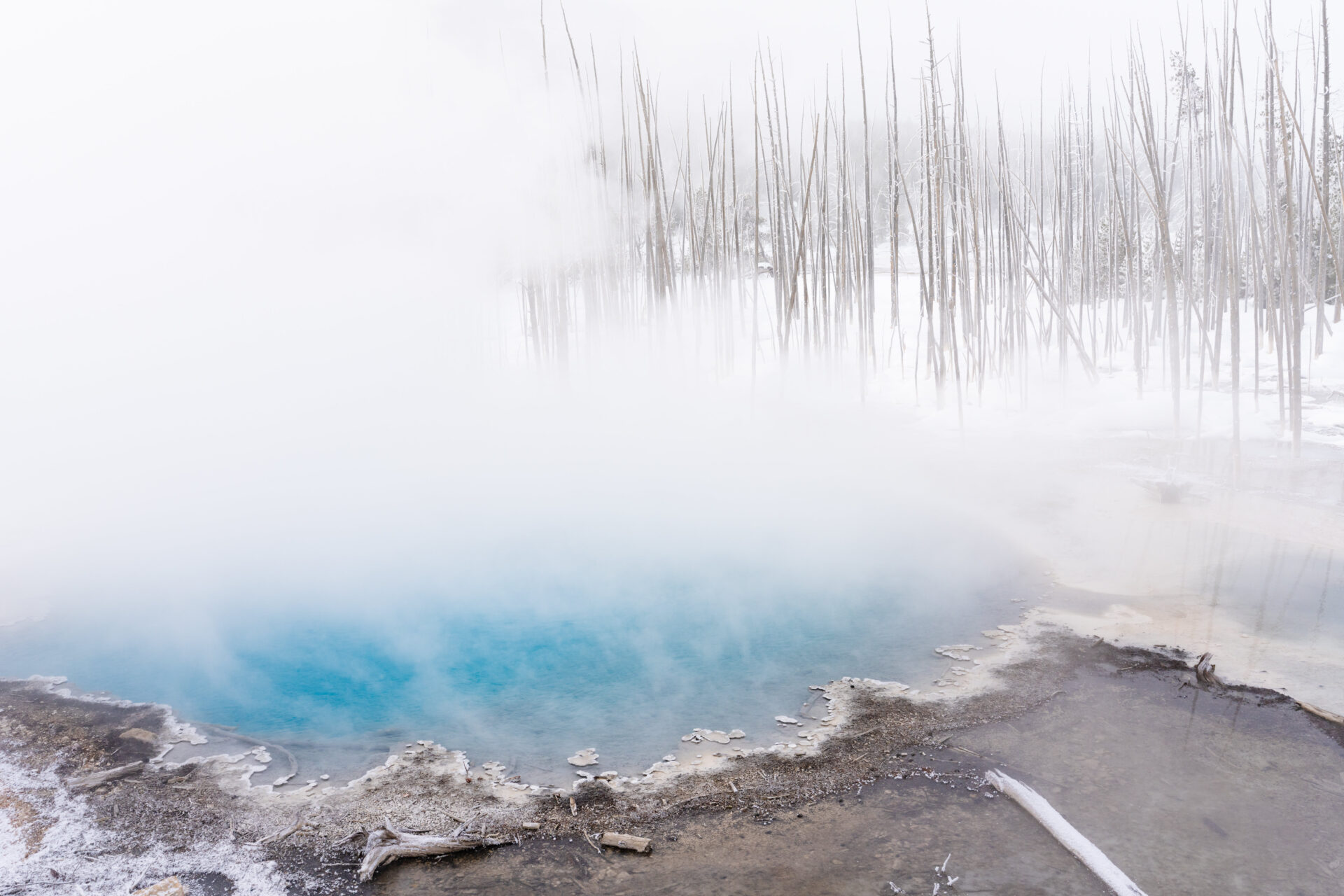 cistern-spring-steam-in-winter-nps-jacob-frank-yellowstone-forever